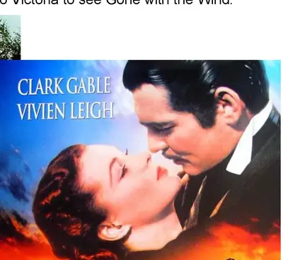 Movie poster for the film "Gone with the Wind" featuring Clark Gable and Vivien Leigh embracing, with a fiery orange sky background and cast photos below the title
