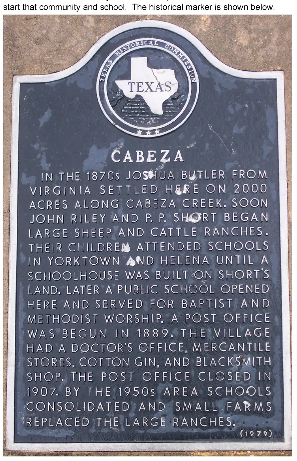 Photograph of a Texas Historical Commission marker titled "Cabeza" describing the history of the Cabeza, Texas community, mounted on a stone base